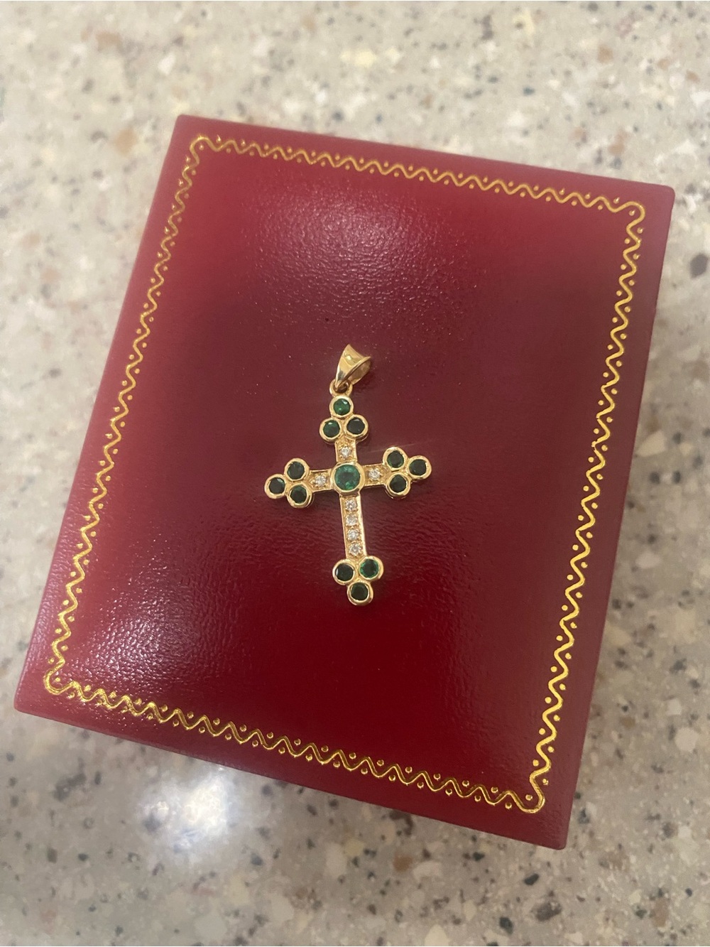 14kt gold tested and marked displaying 12 emeralds 7 diamonds for both sex’s
